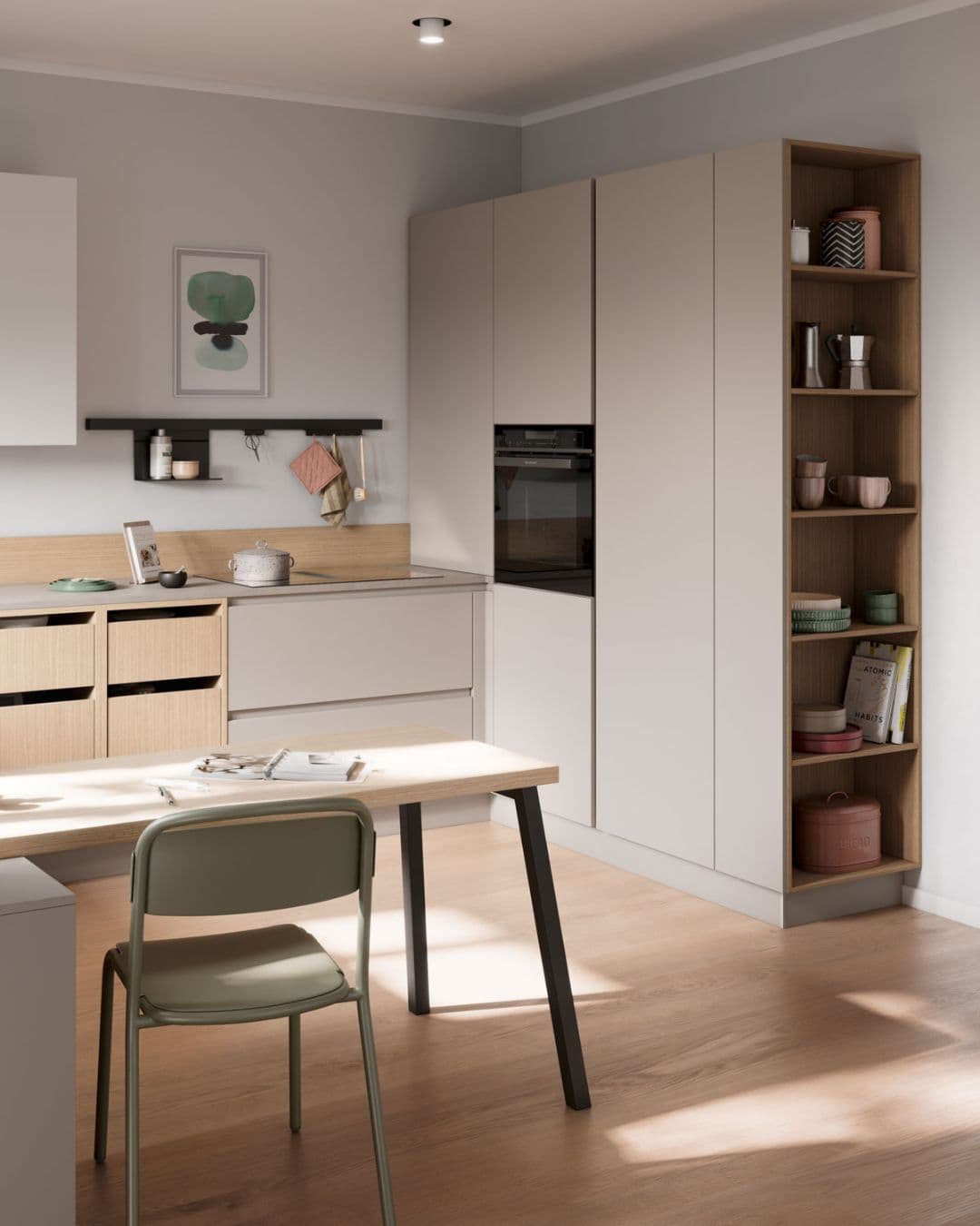 Cuisine moderne beige et bois clair avec rangements intégrés, four encastré et coin repas lumineux. IDEO Cuisines